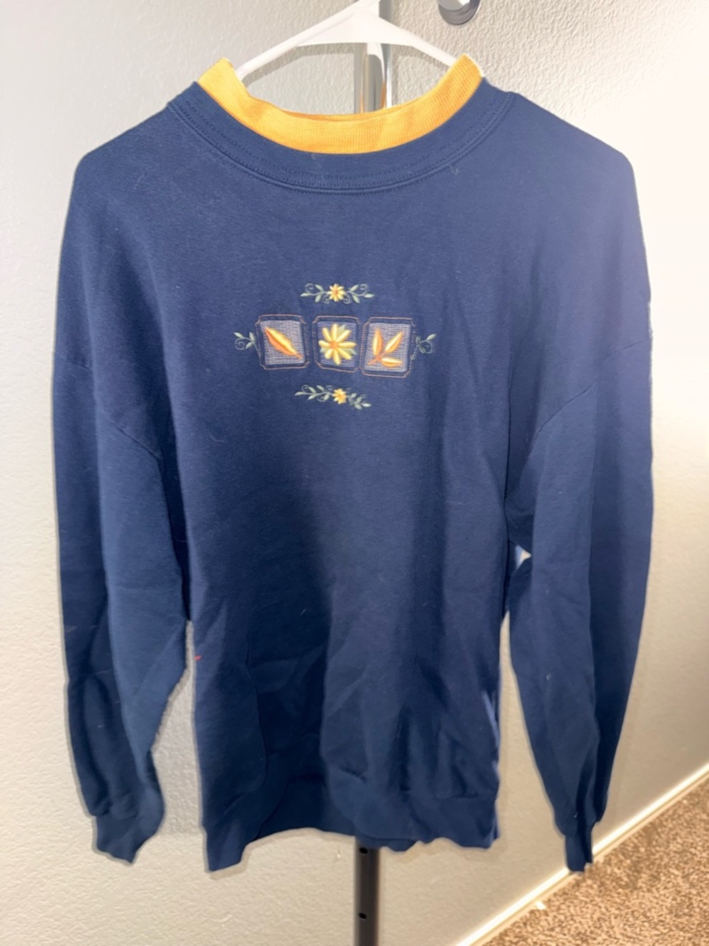 Women's Navy Crewneck Sweatshirt with Yellow Trim and Floral Embroidery